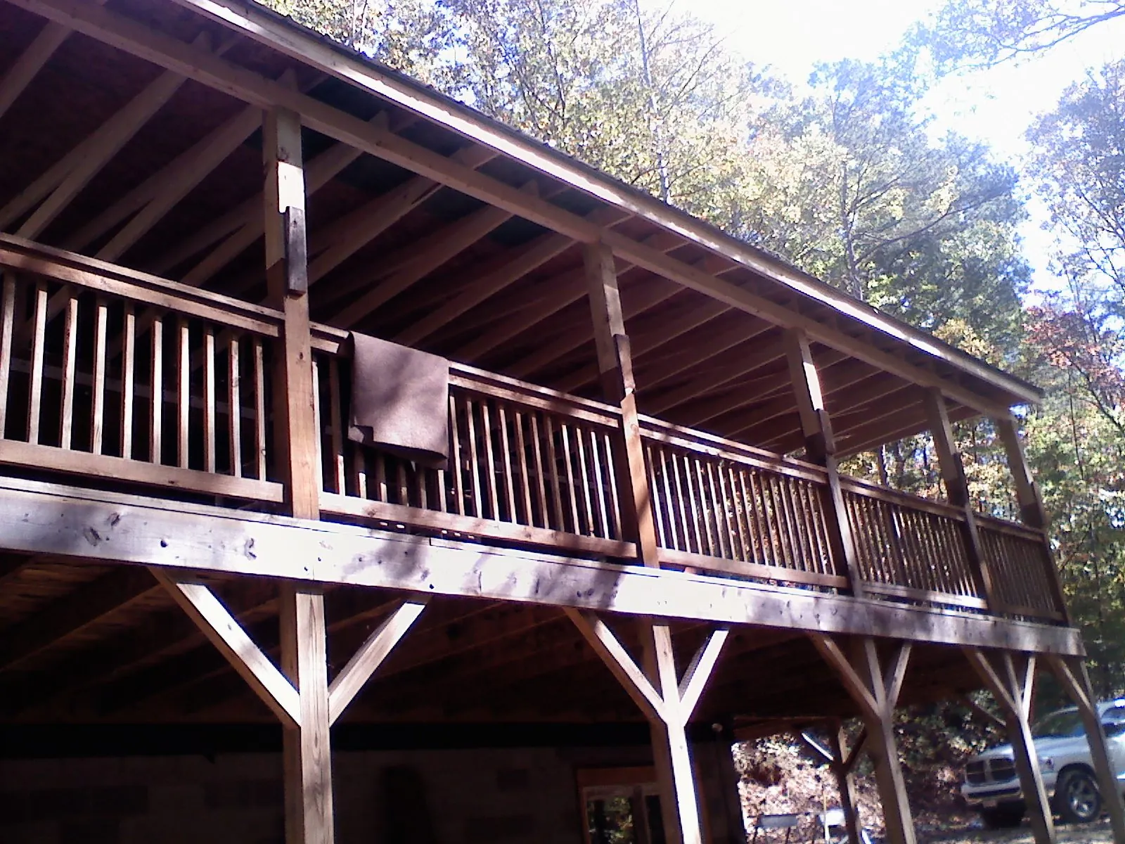 Timber framing under a new elevated porch and deck — Roof Leak Repair in Orgas by Roofing Brothers
